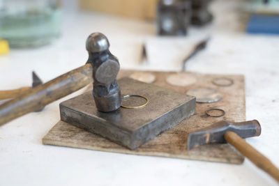 Close-up of hammer on wood