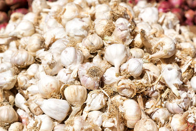 Full frame shot of onions for sale in market