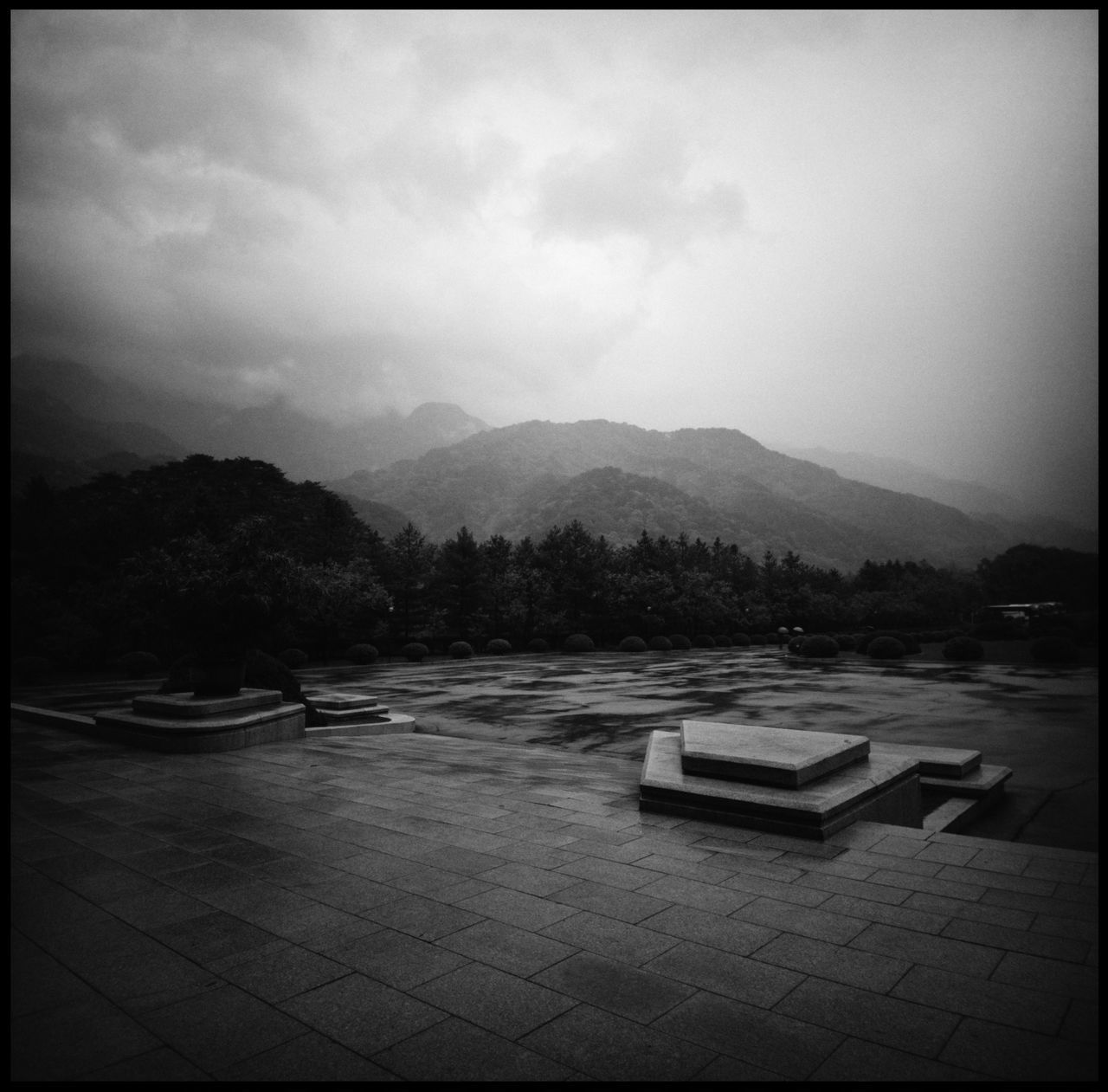 Bowling in Pyongyang Bowling Yanggakdo Hotel Yanggakdo Hotel Bowling In Pyongyang Pyongyang North Korea Architecture Pyongyang Indoors Bell On The Roof Little Bell Bowling Pins Black And White Bowling Film Photography 120 Mm Northkorean Roofs Northkorean Mountains Bowling Fire Chinese Roofs Black And White Photography Bowling Lane No People