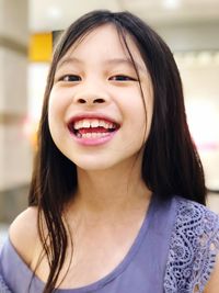 Close-up portrait of a smiling girl