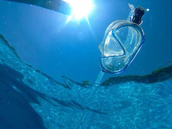 Close-up of scuba mask in sea