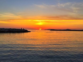 Scenic view of sea during sunset