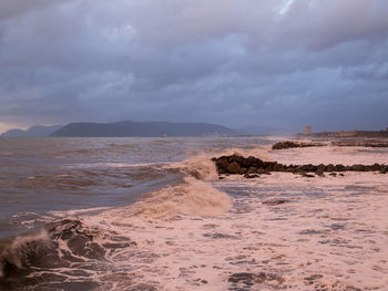 Scenic view of beach against sky