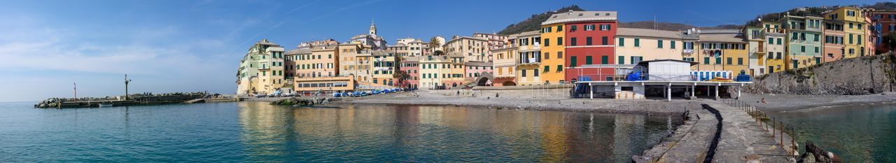 View of buildings against blue sky