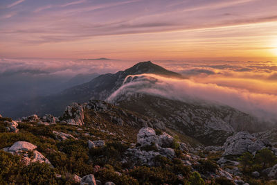 Scenic view of mountains against sky during sunset