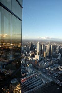 High angle view of modern buildings in city against sky