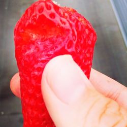 Close-up of hand holding ice cream