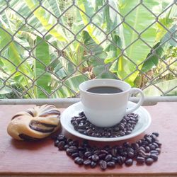 Coffee cup on table