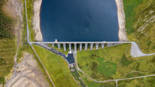 High angle view of land by sea