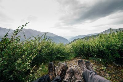 Scenic view of landscape against cloudy sky