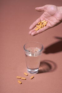 Close-up of drink in glass over white background