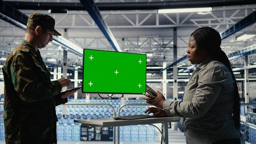 Side view of man working in office