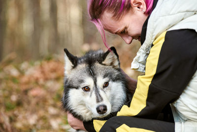 Portrait of woman with dog