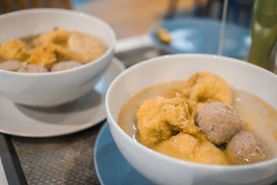 Close-up of noodles in bowl on table