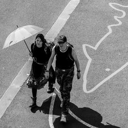 Woman standing on road