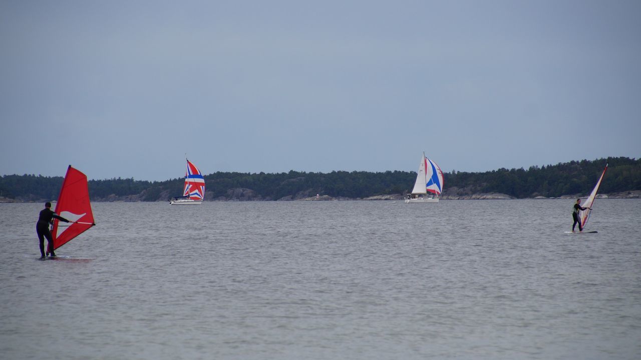 PEOPLE ENJOYING IN THE SEA