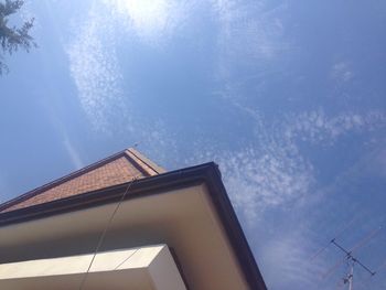 Low angle view of building against blue sky