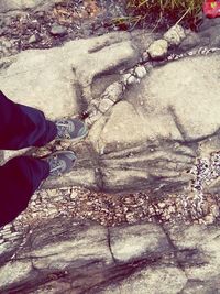 Low section of man standing outdoors