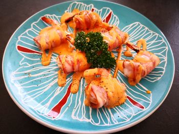 High angle view of prawns in plate on table