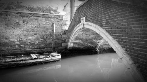 Tilt image of building by water