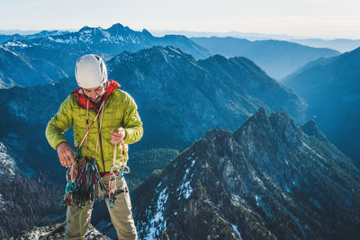 Man looking at mountain range