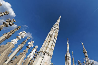 Low angle view of building against blue sky