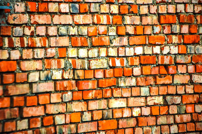 Close-up of multi colored brick wall