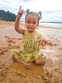 Cute baby girl on beach