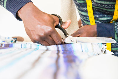 Close-up of man working on table