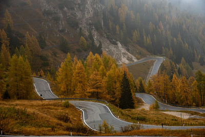 Scenic view of mountain road during autumn