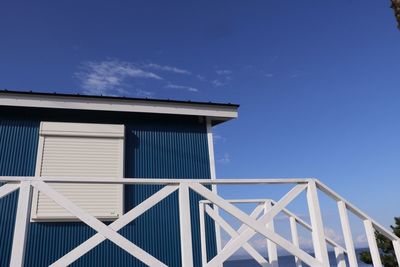 Low angle view of building against blue sky