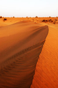 Scenic view of desert against clear sky