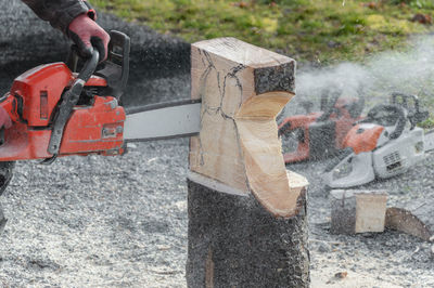 Man cutting wood