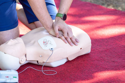 First aid and cpr training using automated external defibrillator device - aed