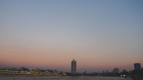 View of buildings against sky during sunset