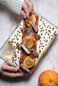 Orange tiramisu, italian dessert with finger biscuit and mascarpone cheese.