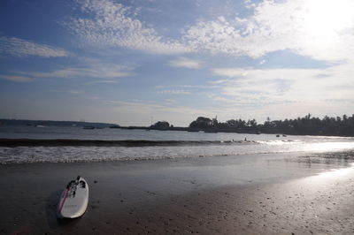 Beach against sky during sunset