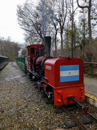 Train on railroad track against sky