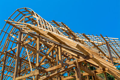 Low angle view of built structure against blue sky