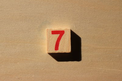 Close-up of number 7 on wood