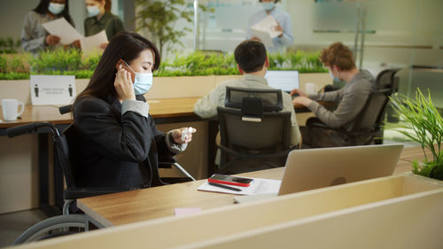 Businesswoman sitting at office