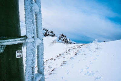 Scenic view of frozen sea against sky