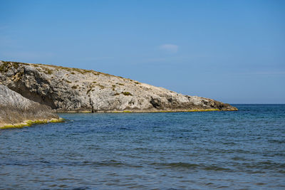 Scenic view of sea against blue sky