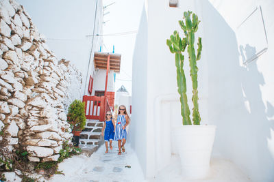 People in front of built structure