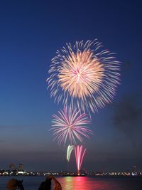 Firework display at night