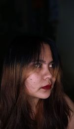 Close-up portrait of young woman