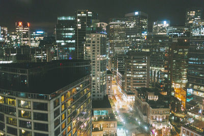 High angle view of illuminated buildings at night