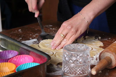 Midsection of man preparing food