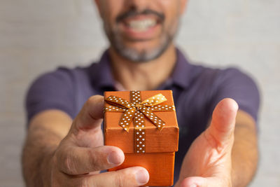 Close-up of hand holding bitcoin