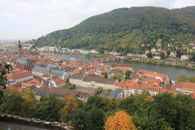 High angle view of buildings by neckar river in city